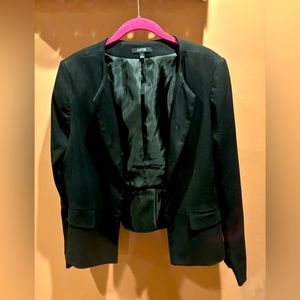 Black blazer with shoulder pads, peplum back, thin lapel